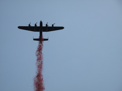Lancaster Bomber dropping poppies over the Bomber Command Memorial in London - June 28th 2012