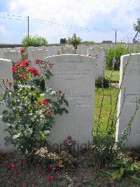 Dochy Farm New British Cemetery - Brassett, G T